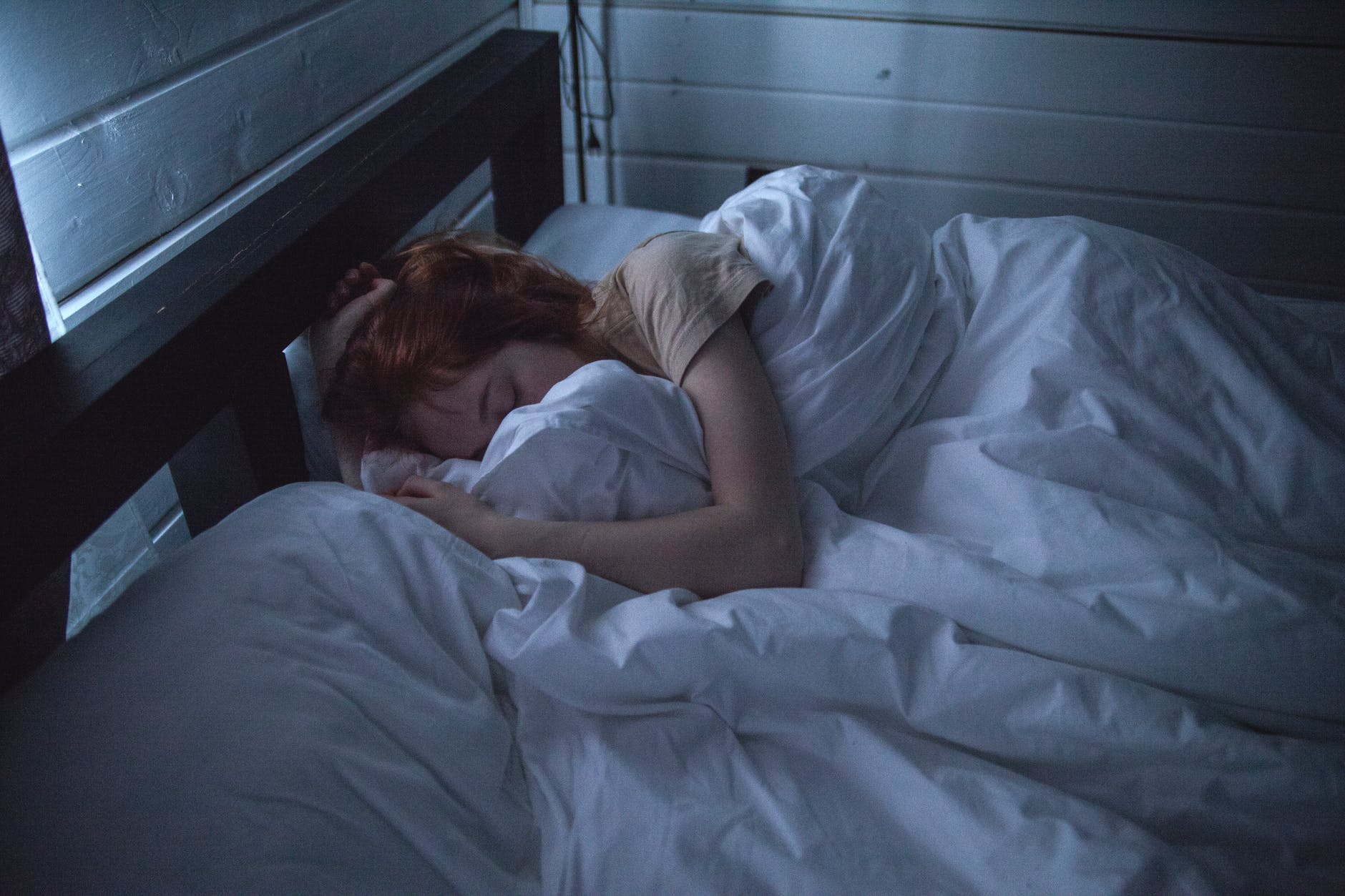 woman sleeping Happiness is the harder choice